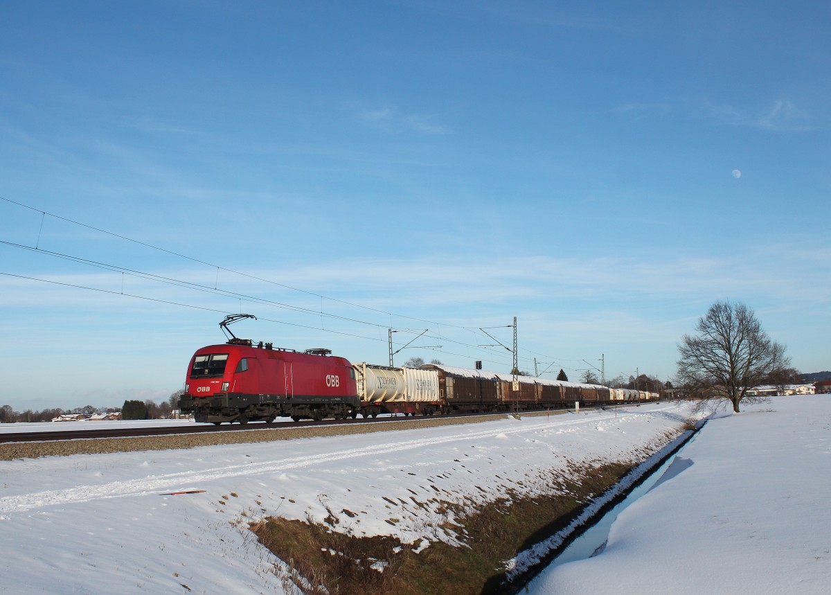 1116 067-0 an einem sonnigen Wintertag bei �bersee am Chiemsee. Aufgenommen am 31. Januar 2015.