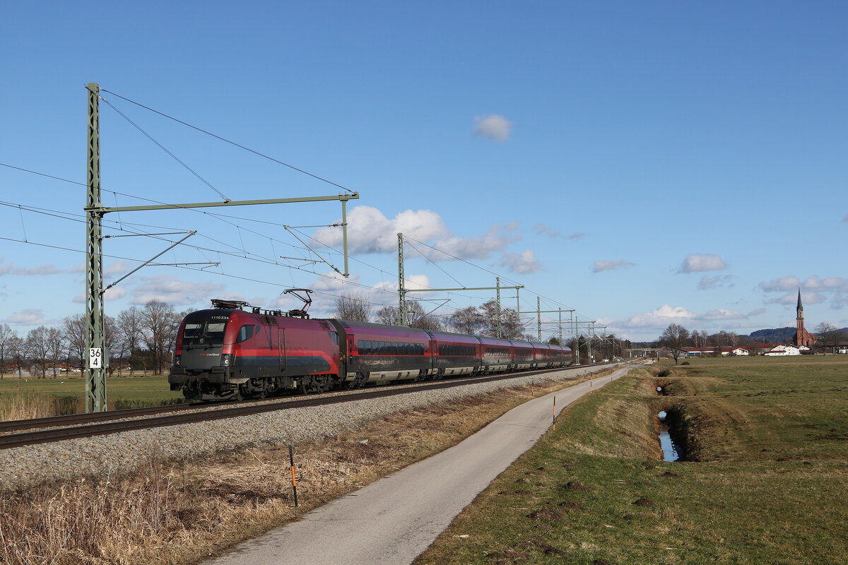 1116 234 auf dem Weg nach M�nchen am 5. Februar 2022 bei �bersee am Chiemsee.