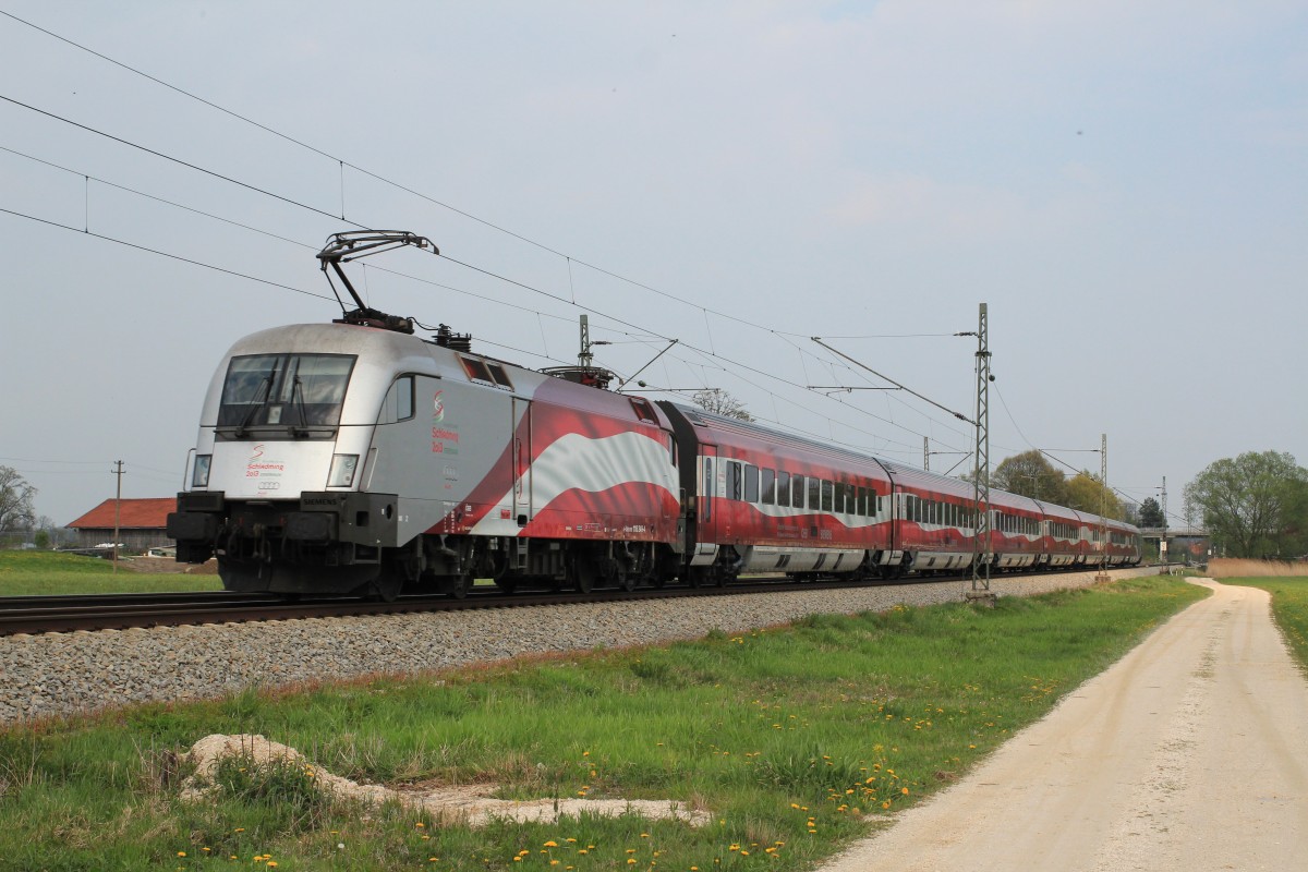 1116 249-4 schiebt den  Ski WM -Railjet am 13. April 2014 bei �bersee in Richtung Salzburg.