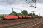 145 078-2 bei der durchfahrt mit einem Sch�ttgutwagenzug des Bahnhof von Hamburg-Harburg.