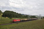 185 605-3 von  Rhein-Cargo  mit einem Kesselwagenzug aus W�rzburg kommend am 18.