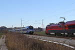 Begegnung in Bernau am Chiemsee zwischen ET 313 und 1116 221 am 22.